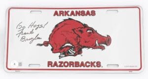 FRANK BROYLES SIGNED ARKANSAS RAZORBACKS LICENSE PLATE HOGS AUTOGRAPH BAS K53
