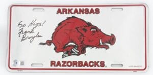 FRANK BROYLES SIGNED ARKANSAS RAZORBACKS LICENSE PLATE HOGS AUTOGRAPH BAS K54
