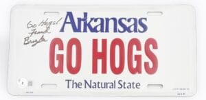 FRANK BROYLES SIGNED ARKANSAS RAZORBACKS LICENSE PLATE HOGS AUTOGRAPH BAS J55