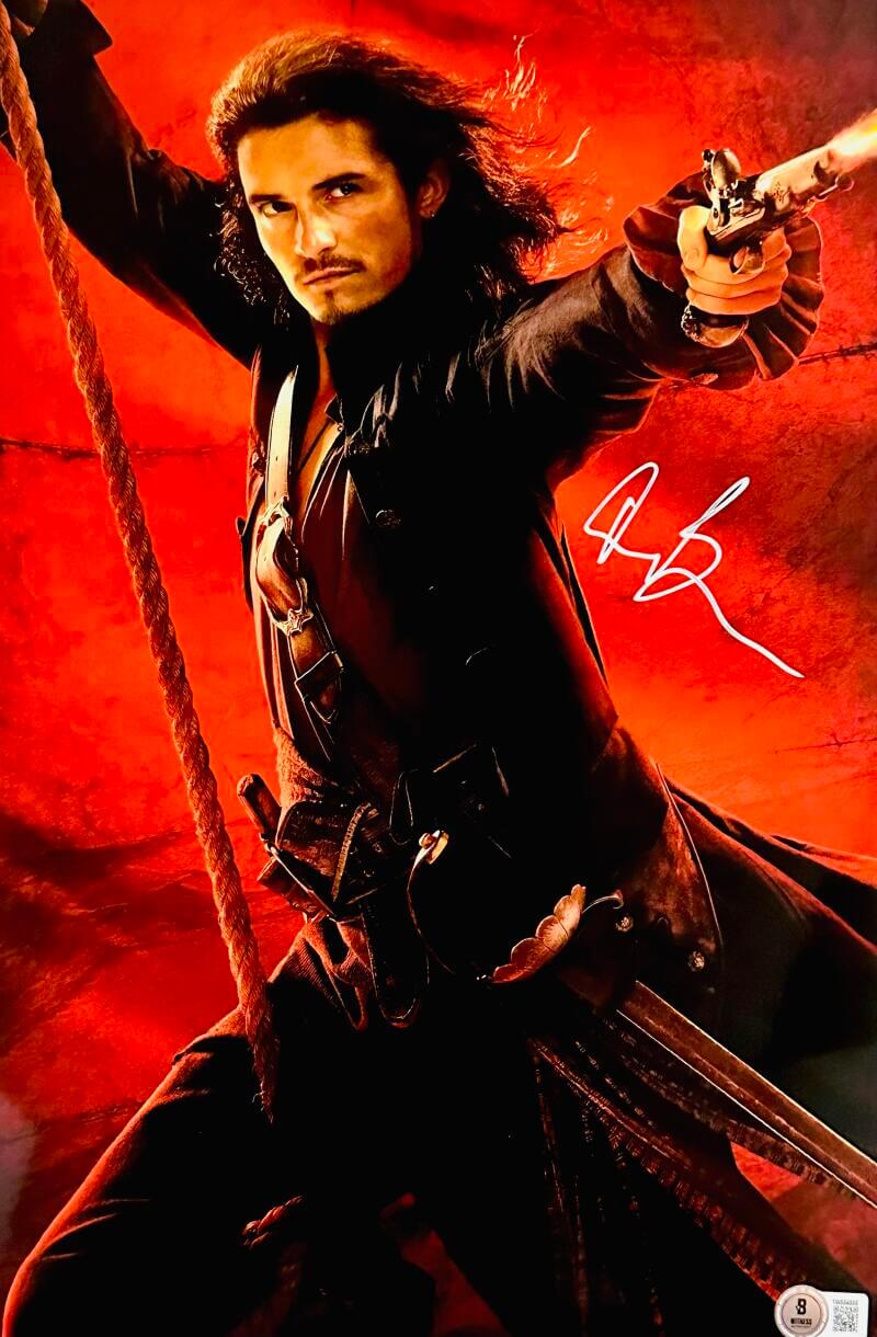ORLANDO BLOOM SIGNED METALLIC 11X17 PHOTO WILL PIRATES OF THE CARIBBEAN BAS 885