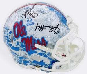 Suntarine Perkins autograph, Kam Franklin autograph, Ole Miss Rebels memorabilia, Realtree mini helmet, dual signed helmet, BAS authenticated, autographed mini helmet, SEC football memorabilia, college football memorabilia, Rebels collectible, camo helmet display, linebacker autograph, defensive end autograph, Ole Miss defense, multi-signed collectible
