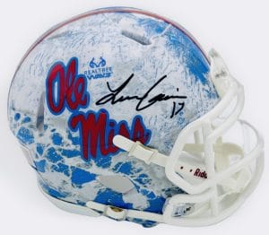 Lucas Carneiro autograph, Lucas Carneiro signed, Ole Miss Rebels memorabilia, Realtree mini helmet, signed mini helmet, BAS authenticated, autographed mini helmet, kicker autograph, SEC football memorabilia, college football memorabilia, Rebels collectible, camo helmet display, Lou Groza watch list, CFP memorabilia, mini helmet collectible