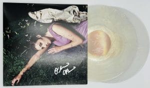 Olivia O'Brien autograph, Olivia O'Brien signed, Pixie album memorabilia, signed vinyl record, pop music memorabilia, BAS authenticated, autographed vinyl album, Heaven vinyl, vinyl record collectible, music memorabilia, pop star autograph, Pixie vinyl, signed album, singer-songwriter collectible, indie pop memorabilia