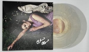 Olivia O'Brien autograph, Olivia O'Brien signed, Pixie album memorabilia, signed vinyl record, pop music memorabilia, BAS authenticated, autographed vinyl album, Heaven vinyl, vinyl record collectible, music memorabilia, pop star autograph, Pixie vinyl, signed album, singer-songwriter collectible, indie pop memorabilia