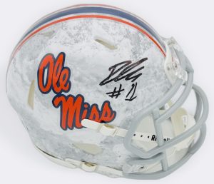 Deuce Alexander autograph, Deuce Alexander signed, Ole Miss Rebels memorabilia, Realtree mini helmet, signed mini helmet, BAS authenticated, autographed mini helmet, wide receiver autograph, SEC football memorabilia, college football memorabilia, Rebels collectible, camo helmet display, Ole Miss offense, mini helmet collectible, breakout star autograph