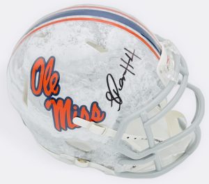 Suntarine Perkins autograph, Suntarine Perkins signed, Ole Miss Rebels memorabilia, Realtree mini helmet, signed mini helmet, BAS authenticated, autographed mini helmet, linebacker autograph, SEC football memorabilia, college football memorabilia, Rebels collectible, camo helmet display, All-American autograph, Ole Miss defense, mini helmet collectible
