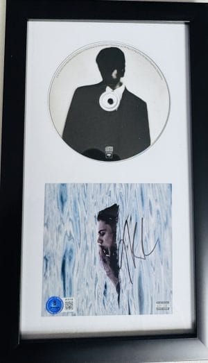 The Kid LAROI autograph, The Kid LAROI signed, Before I Forget autograph, Before I Forget CD, signed CD booklet, framed CD display, music memorabilia, signed music collectible, pop music autograph, hip hop memorabilia, framed autograph display, music fan collectible, Beckett authenticated, BAS certified autograph, signed CD artwork, The Kid LAROI collectible, framed music memorabilia, autograph display piece, music room decor, signed entertainment memorabilia