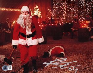 Rohan Campbell autograph, Silent Night Deadly Night signed, horror movie memorabilia, holiday horror collectible, signed 8x10 photo, slasher film autograph, BAS certified autograph, horror collector item, Christmas horror movie, signed movie photo, cult horror collectible, horror fan item, movie autograph, festive horror collectible, rising actor autograph