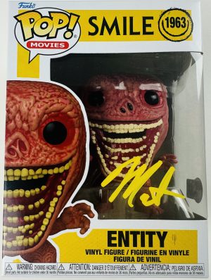 Marti Matulis autograph, Smile Entity Funko, Smile movie collectible, Smile Funko Pop 1963, horror Funko Pop, signed Funko Pop, Smile Entity collectible, horror memorabilia, BAS certified autograph, Smile horror film, creepy Funko Pop, modern horror collectible, horror collector item, autograph Funko, Smile movie merch