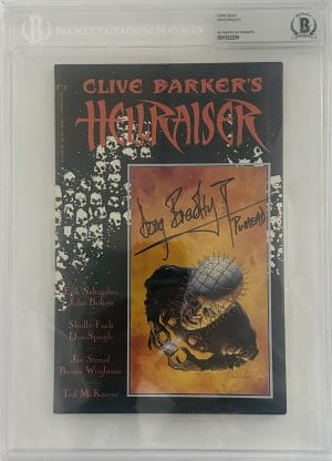 Doug Bradley Signed Clive Barker’s Hellraiser #1 – Epic Comics (1989) First Print – Autographed with BAS Authentication Own a chilling piece of horror history with this Doug Bradley signed Clive Barker’s Hellraiser #1 comic book, published by Epic Comics in 1989. This first print issue marks the beginning of the legendary comic series based on the groundbreaking horror universe created by Clive Barker, expanding the dark mythology of the Hellraiser franchise. This collectible comic has been hand-signed by Doug Bradley, the iconic actor who portrayed Pinhead in the original Hellraiser films. Bradley’s unforgettable performance helped cement Pinhead as one of the most recognizable villains in horror history, making this signed issue a must-have for fans of the franchise and serious horror memorabilia collectors. Hellraiser #1 from Epic Comics dives deeper into the terrifying world of the Cenobites, the Lament Configuration puzzle box, and the dark dimensions of pain and pleasure that define Barker’s universe. As the first issue of the comic series, it holds significant importance for collectors of horror comics, Hellraiser fans, and autograph enthusiasts alike. This autograph has been authenticated by Beckett Authentication Services (BAS), one of the most trusted third-party authentication companies in the collectibles industry. The BAS certification confirms the signature’s authenticity, giving collectors confidence and long-term value when adding this piece to their horror collection. Whether you’re a fan of Doug Bradley, Clive Barker, Hellraiser comics, or classic horror memorabilia, this signed 1989 Epic Comics first printing of Hellraiser #1 is a standout collectible perfect for display, grading, or long-term investment. Perfect for collectors of: Hellraiser movie memorabilia Doug Bradley autographs Clive Barker horror collectibles Vintage horror comics Epic Comics releases Signed comic book collectibles Horror movie villain memorabilia Add this Doug Bradley autographed Hellraiser #1 comic to your collection today and own a piece of the dark and twisted world of Hellraiser.
